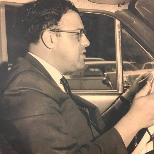 Mickey Adler driving to demo in 1950s Micky Adler driving to demo his innovative solutions to customers in the 1950s
